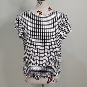 ADRIANNA PAPELL checked black and cream top with butterfly sleeves. Size is Med.